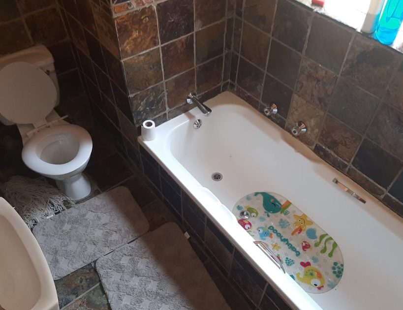 Bathroom before renovation plumbing work